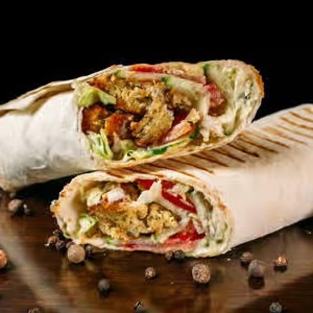 Falafel Sandwich, French Fries and Can Soda.